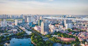 Toàn cảnh khu đô thị hiện đại với các tòa nhà cao tầng và không gian xanh ven hồ, minh họa vị trí đắc địa của dự án AVA Center